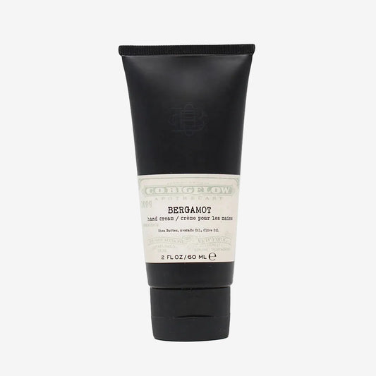 Black tube of bergamot hand cream with white label on a white background